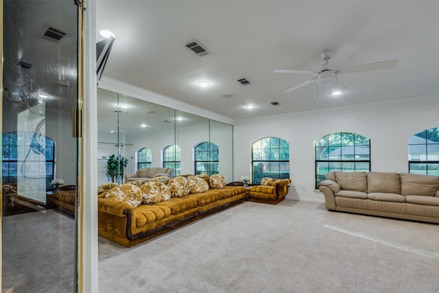 carpeted living room featuring ornamental molding and visible vents