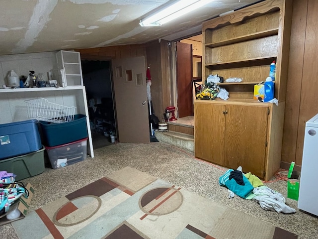 interior space featuring wooden walls