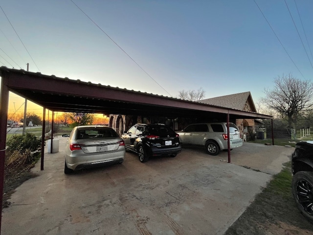 view of parking at dusk