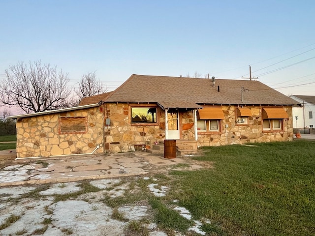 exterior space with a front lawn