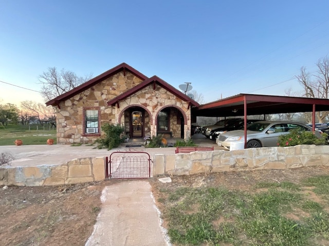 view of front of house featuring a carport