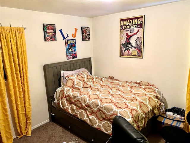 carpeted bedroom with baseboards