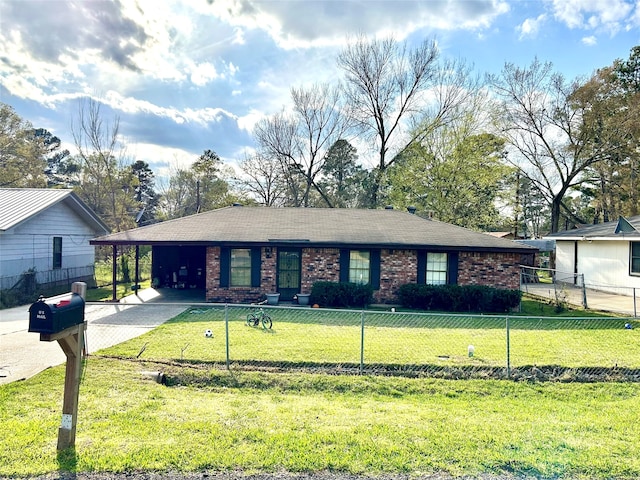 ranch-style home featuring a front lawn and a carport