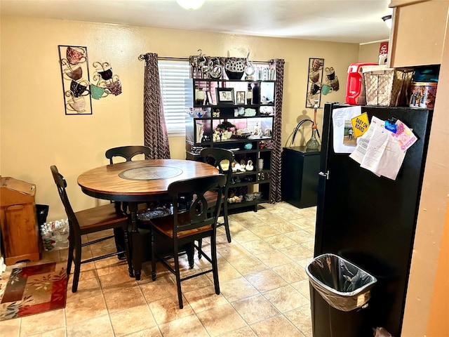 dining room featuring light tile flooring