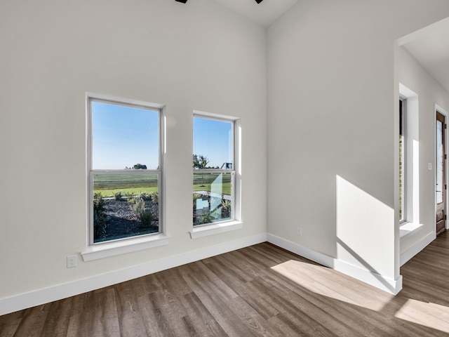 spare room featuring hardwood / wood-style flooring