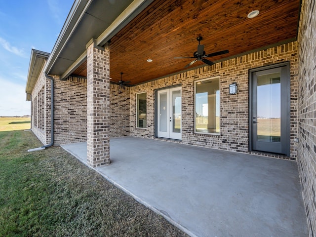 view of patio featuring ceiling fan