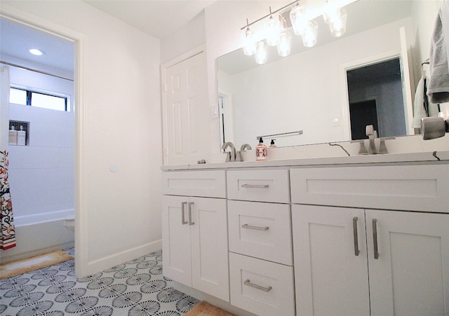 bathroom with vanity, tile flooring, and shower / bath combo