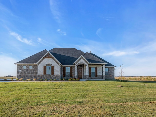 craftsman-style home with a front yard