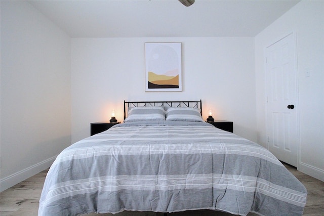 bedroom featuring a closet and light wood-type flooring