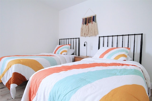 bedroom featuring hardwood / wood-style floors