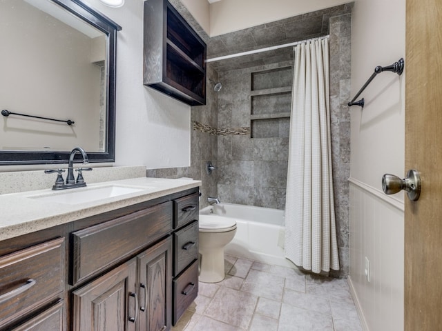 full bathroom with vanity, toilet, and shower / tub combo