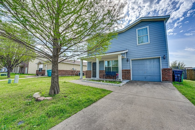 front facade featuring a front yard and a garage