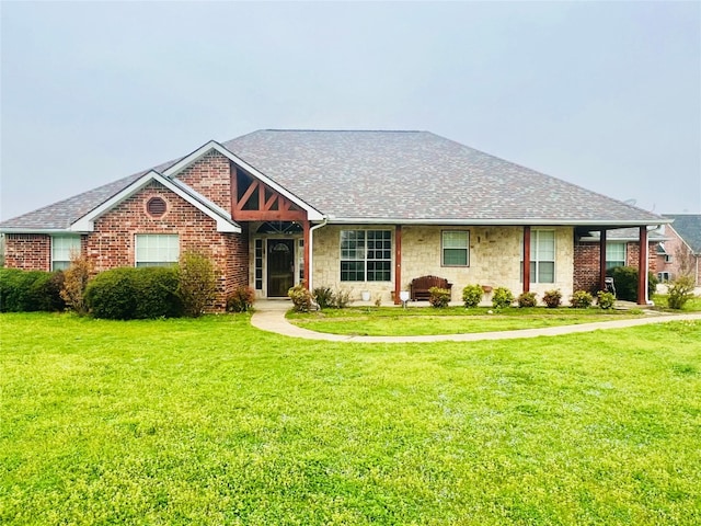 single story home featuring a front yard