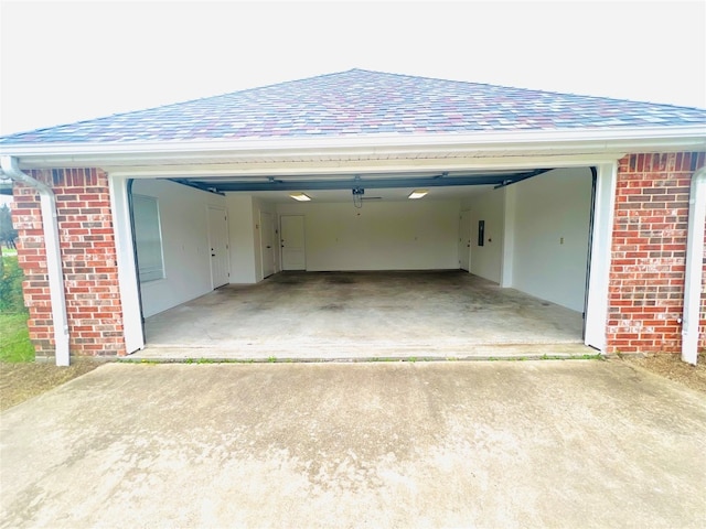 garage featuring a carport