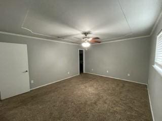 carpeted spare room with crown molding and ceiling fan