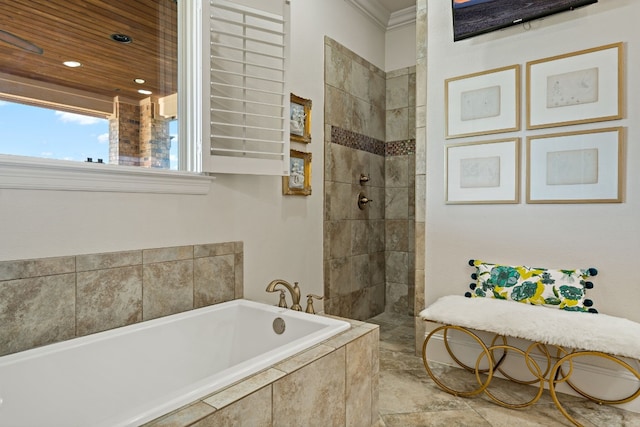 bathroom featuring separate shower and tub