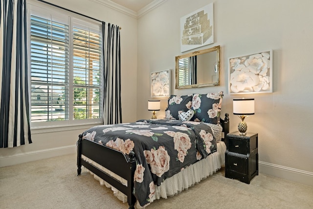 bedroom featuring ornamental molding and light carpet