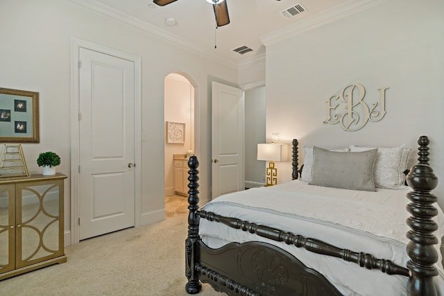 carpeted bedroom with crown molding and ceiling fan