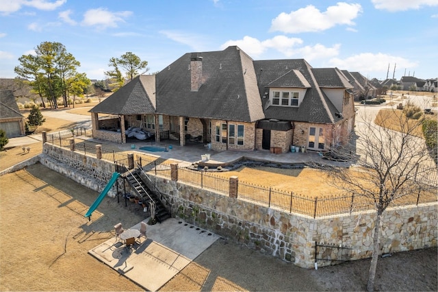 back of house with a patio area