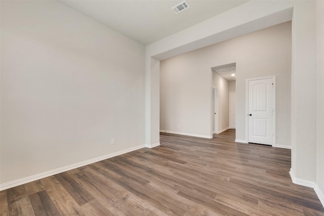 empty room featuring hardwood / wood-style floors