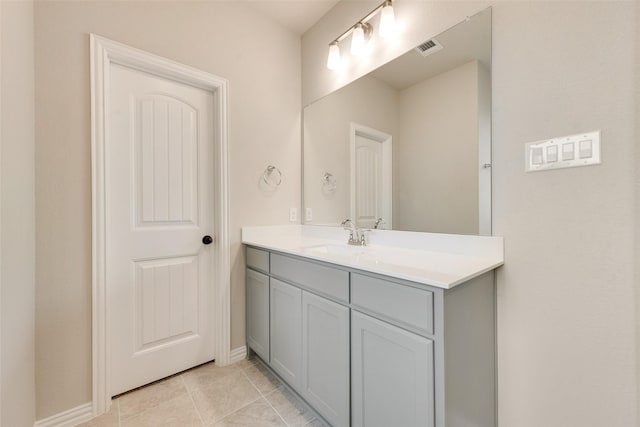 bathroom featuring vanity and tile patterned flooring