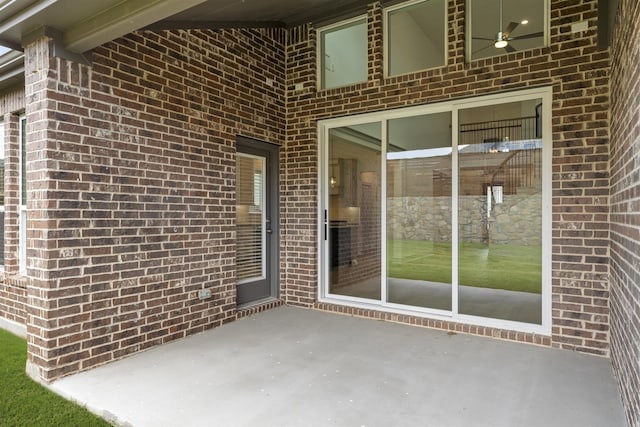 1841 Jasmine June, Mesquite, TX 75181 - view of exterior entry featuring a patio and brick siding