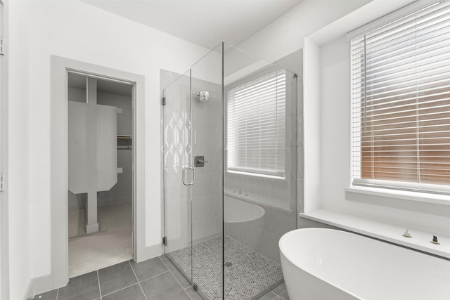 1841 Jasmine June, Mesquite, TX 75181 - bathroom featuring tile patterned floors, plenty of natural light, a soaking tub, and a shower stall