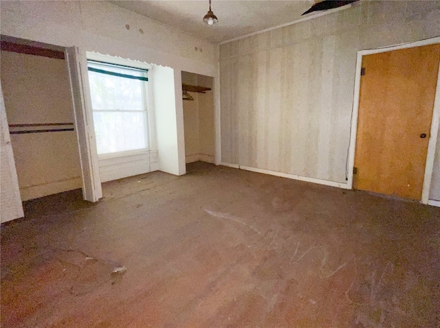 unfurnished bedroom with carpet flooring