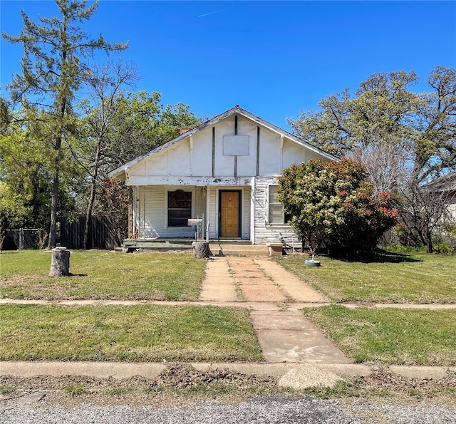 bungalow with a front lawn