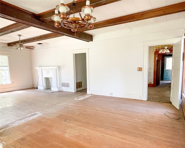 unfurnished room with light hardwood / wood-style floors, ceiling fan with notable chandelier, and beam ceiling