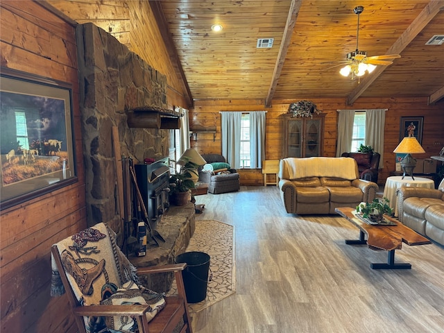 living room with wooden ceiling, hardwood / wood-style flooring, lofted ceiling, and a healthy amount of sunlight