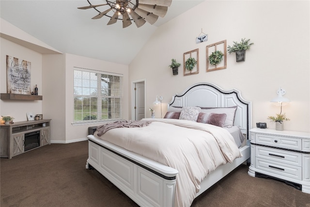 carpeted bedroom featuring vaulted ceiling and ceiling fan