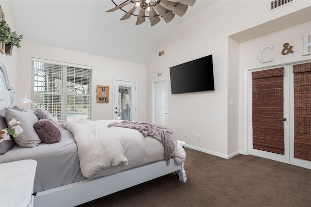 carpeted bedroom with ceiling fan, french doors, and high vaulted ceiling