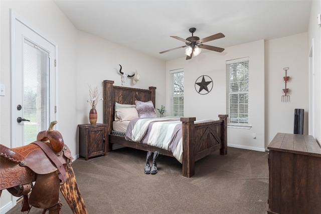 bedroom with dark carpet and ceiling fan