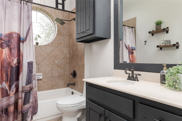 full bathroom with shower / tub combo, vanity, and toilet