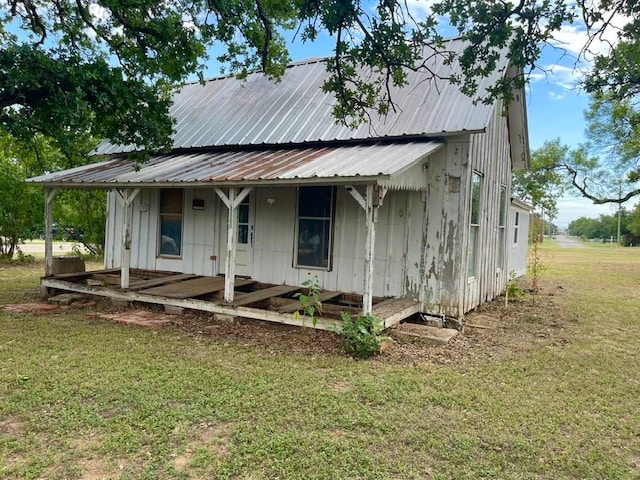 exterior space with a front lawn