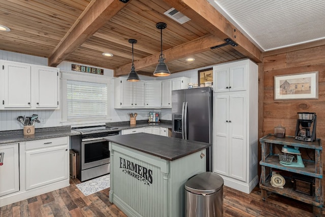 kitchen featuring stainless steel appliances, wooden ceiling, beamed ceiling, white cabinetry, and hanging light fixtures