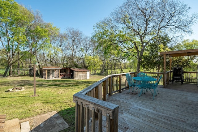 wooden deck with a yard