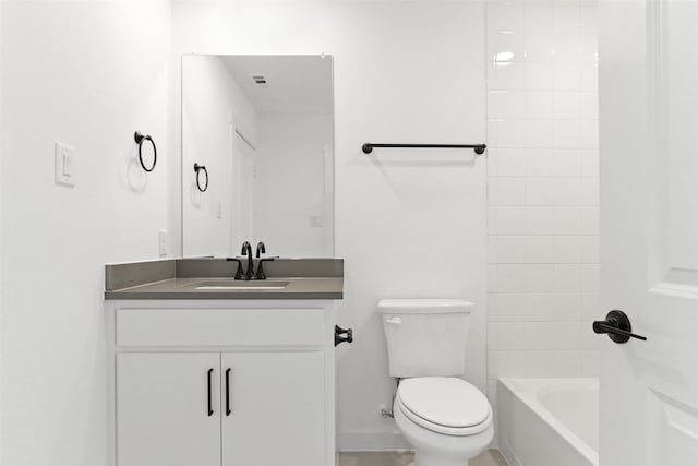 full bathroom with tub / shower combination, vanity, and toilet