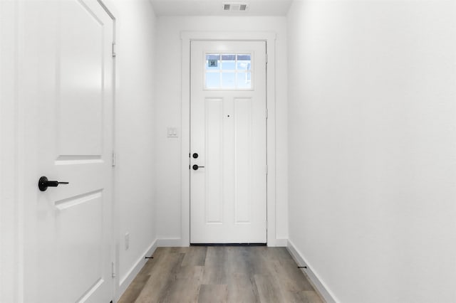 doorway featuring light wood-type flooring