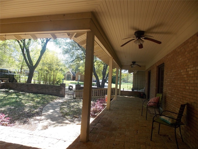 view of terrace featuring ceiling fan