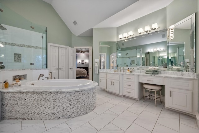 bathroom with high vaulted ceiling, double sink vanity, tile flooring, and a relaxing tiled bath