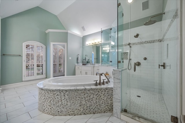 bathroom with tile flooring, lofted ceiling, shower with separate bathtub, and large vanity