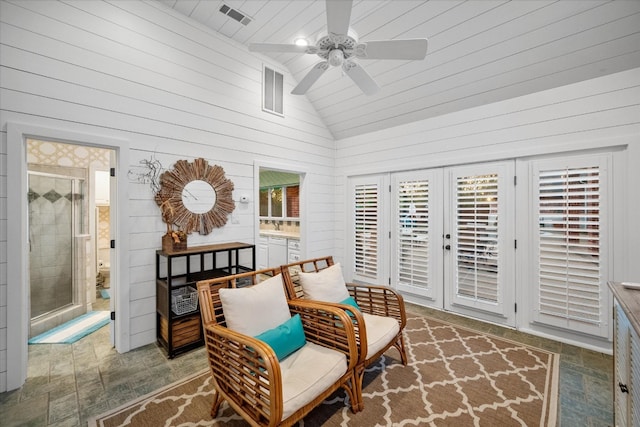 sunroom with french doors, wooden ceiling, ceiling fan, and vaulted ceiling