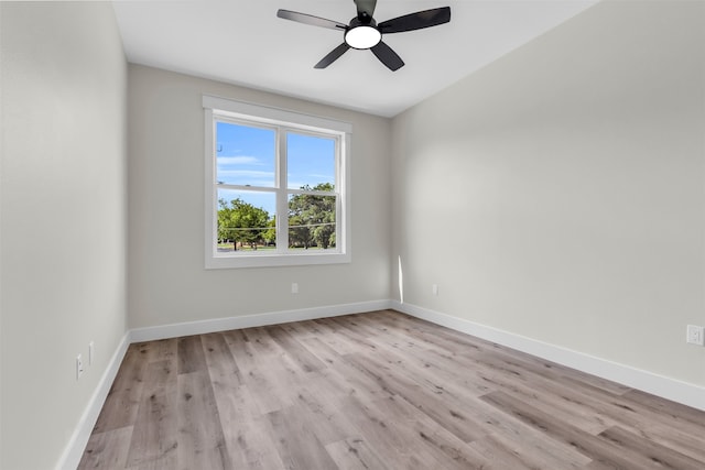 unfurnished room featuring light hardwood / wood-style floors and ceiling fan