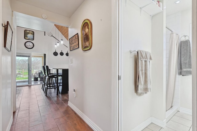 hallway featuring light wood-type flooring