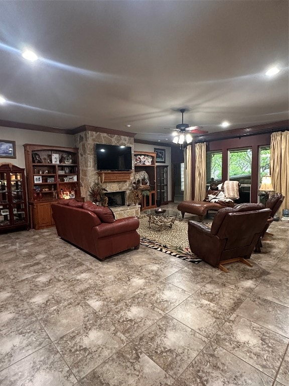 tiled living room with ceiling fan and a fireplace