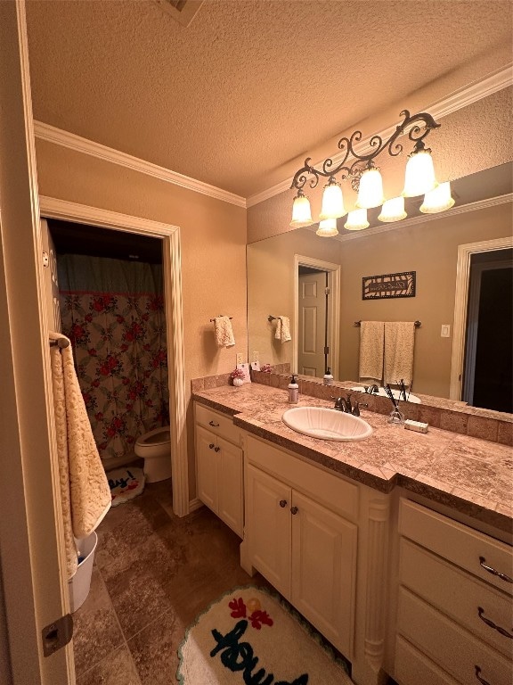 bathroom with toilet, large vanity, ornamental molding, a textured ceiling, and tile flooring