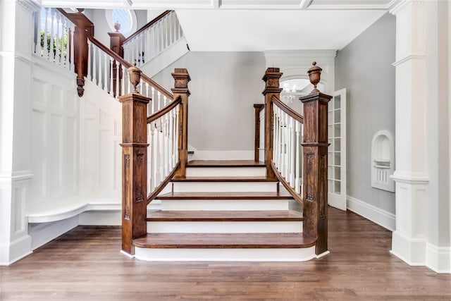 stairs featuring dark wood-type flooring