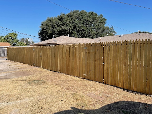 view of yard with fence